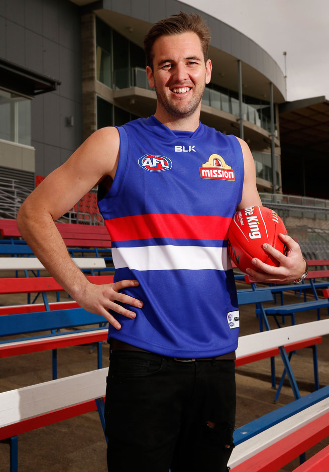 AFL 2015 Media - Matthew Suckling Press Conference Matt Suckling shows off his new colours at Whitten Oval on Monday - ${keywords}